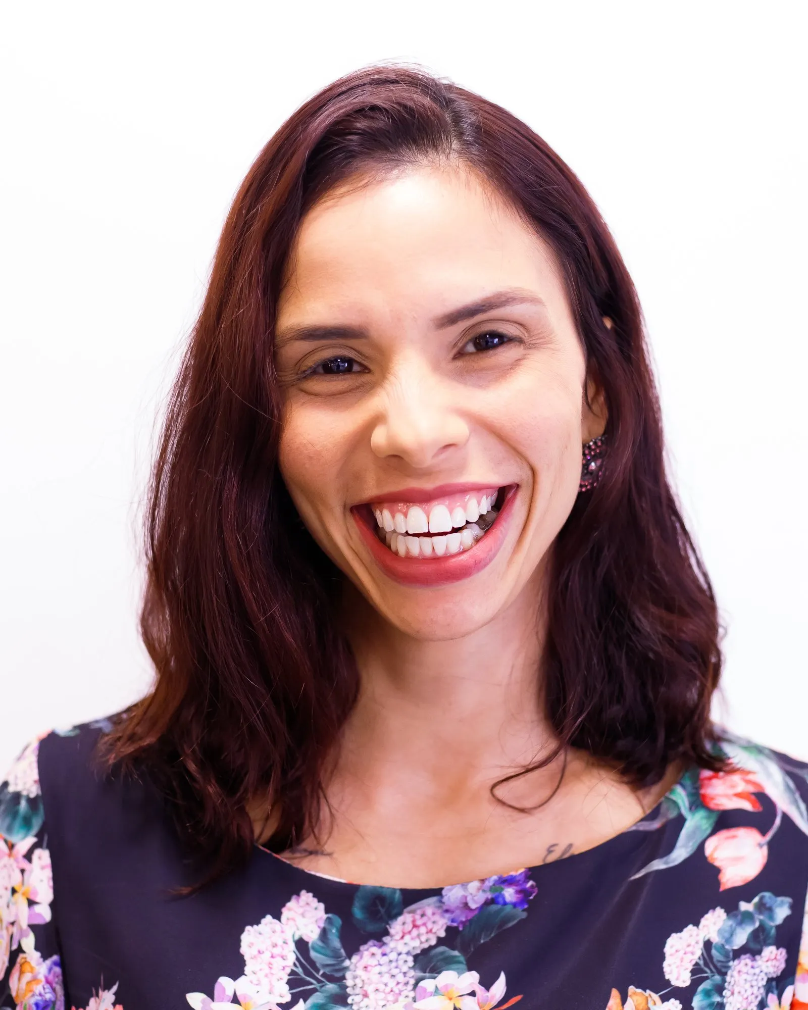Paciente sorrindo no consultório